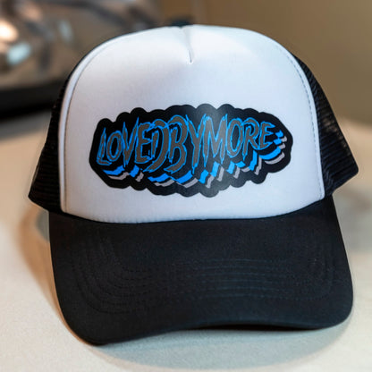 Loved By More™ Trucker Hat